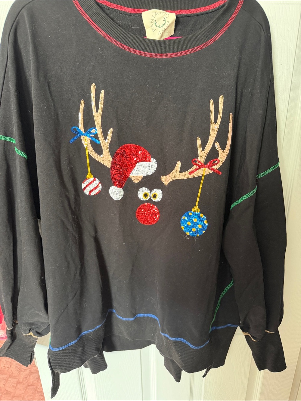 Fantastic Fawn Black Sequin Reindeer Sweatshirt with Red and Blue Accents